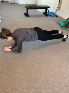Image of a woman doing a plank